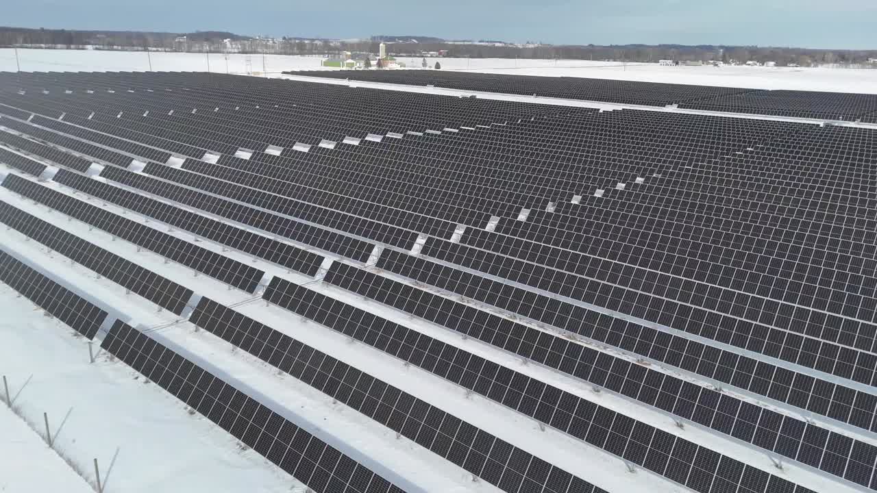 During the winter, a Wisconsin field of solar panels absorbs the sun's energy and converts it to electricity.