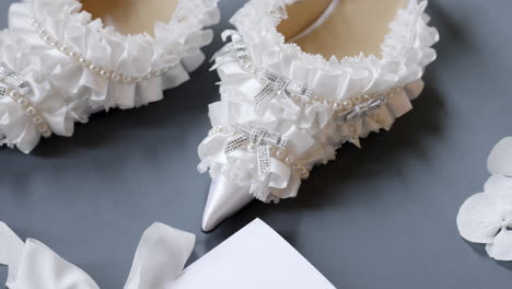 elegant white bridal shoes with ruffles and pearls