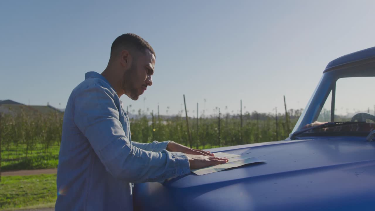 Young man on a road trip in pick-up truck