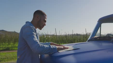 young man on a road trip in pick-up truck