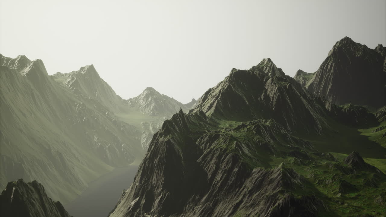Majestic mountain range under soft sunlight in a serene landscape