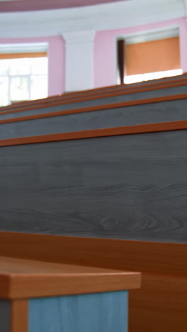 empty seats in university classroom. empty lecture hall with large amount of seats. vertical video