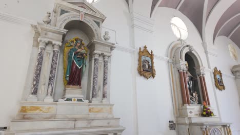 slow panning shot of beautiful architecture within santa marta cathedral