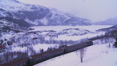 a train travels through a snowy landscape in europe 1