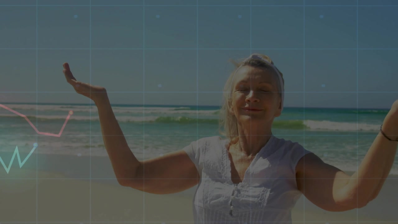 Mulher idosa começando com os braços estendidos na praia, abaixando as mãos em pose de atenção plena em meio a gráficos de grade