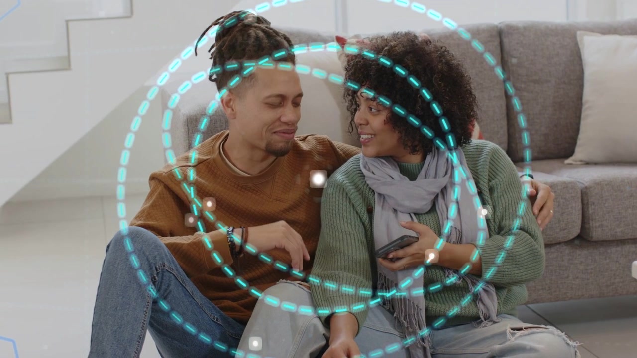 Dot popping by shoulder sparking couple holding phone leaning smiling as AR rings expanding linking