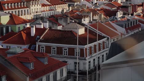 close: building through fence during sunset in lisbon, portugal