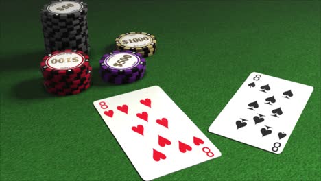 cartas repartidas en una mesa de póquer con montones de fichas de juego - manos de póquer - un par de ochos - ocho de corazones y ocho de picas