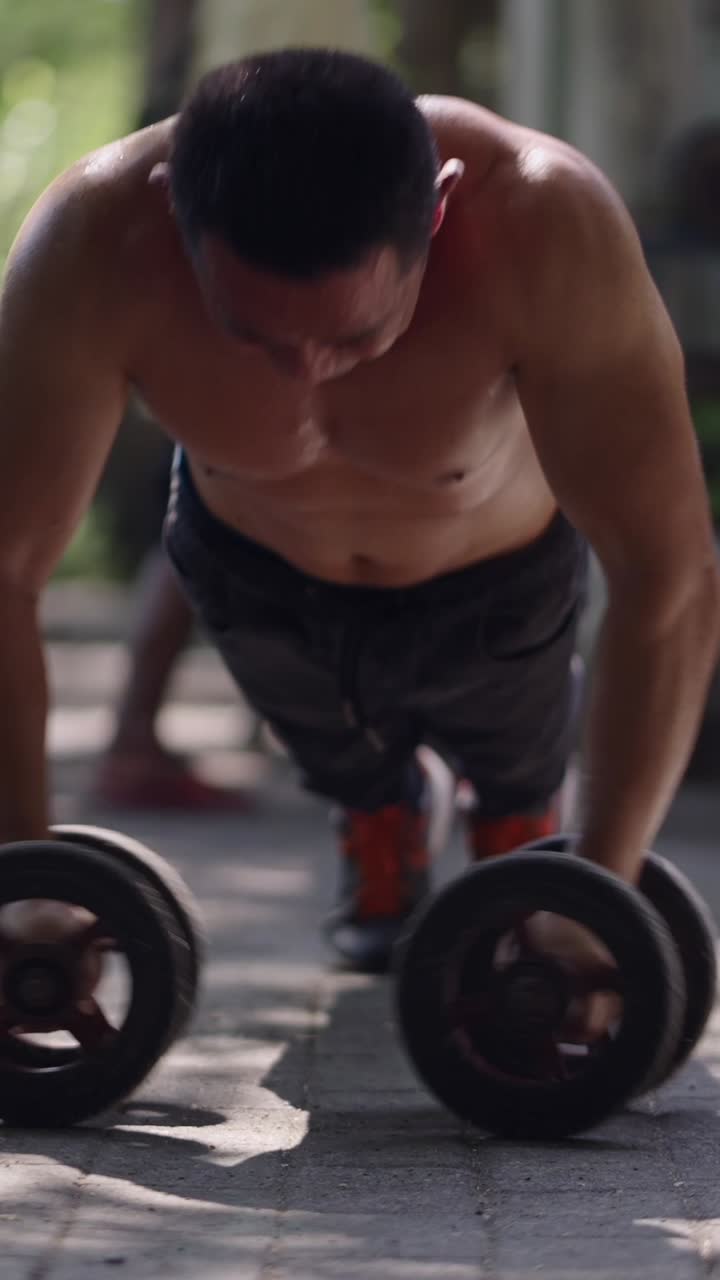 Man doing abdominal exercises with ab roller