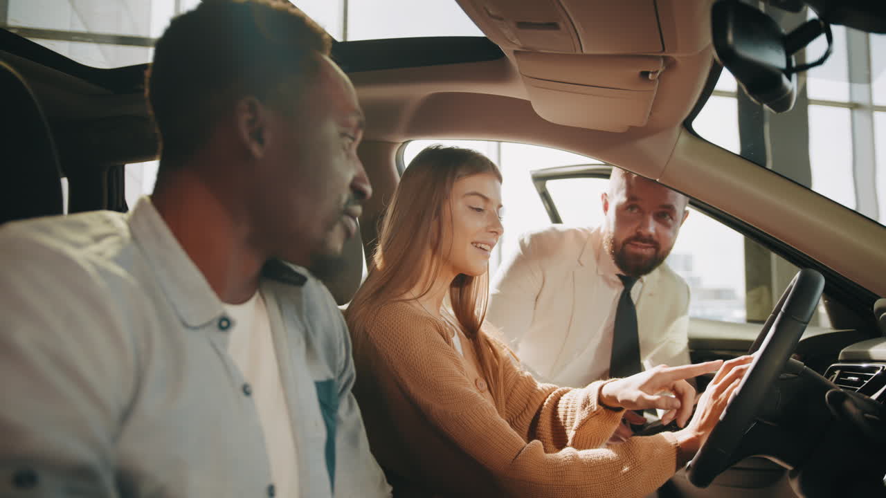 Customer test driving a new car in a dealership