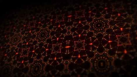 Orange fiery glowing kaleidoscope patterns. Floral ornament from small dots. Dynamic looping background.
