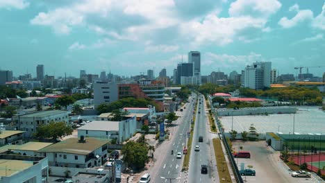 victoria island lagos, nigeria - 24 june 2021: drone view of major roads and traffic in victoria island lagos showing the cityscape, offices and residential buildings.