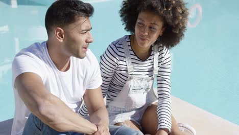 attractive couple chatting in the sun