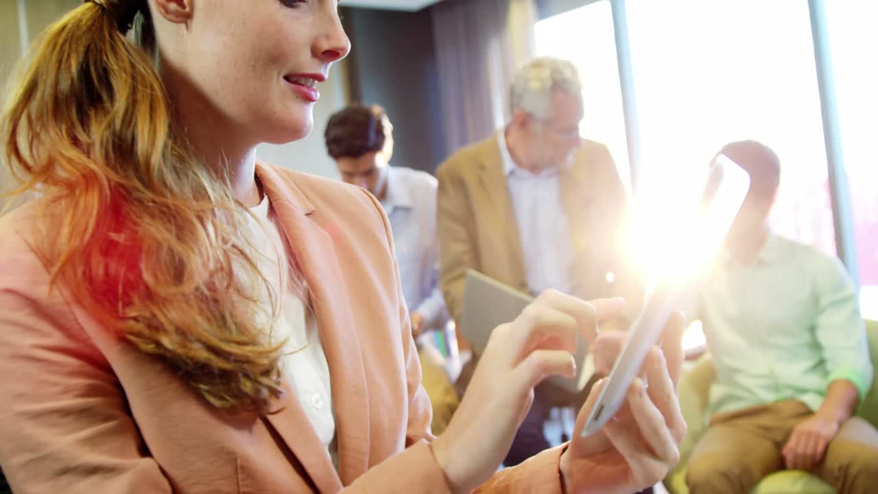 Businesswoman using digital tablet
