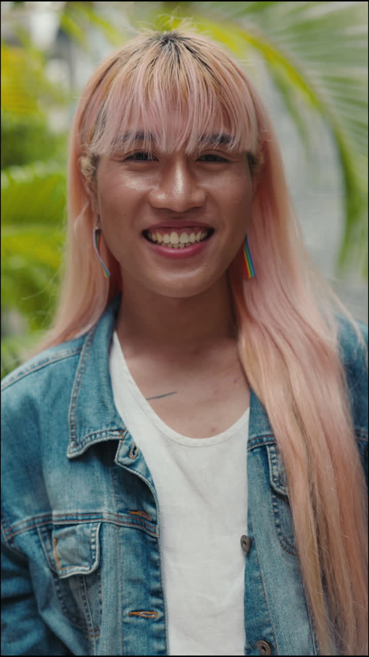Portrait of a Smiling Transgender Person