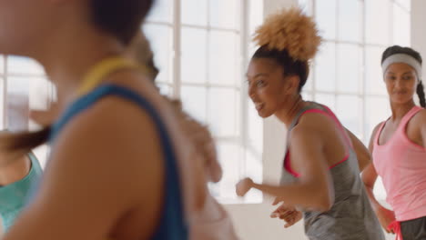 dance class happy group of multi ethnic people dancing enjoying training workout practicing choreography moves in fitness studio