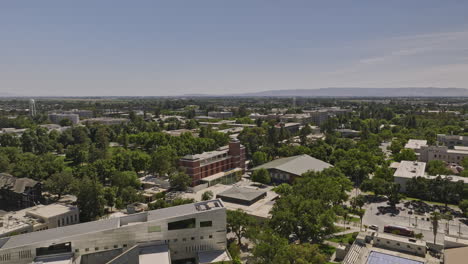 davis california aerial v4 panoramic view low flyover university campus area capturing department buildings, school library, green fields and lawns in summer - shot with mavic 3 cine - june 2022