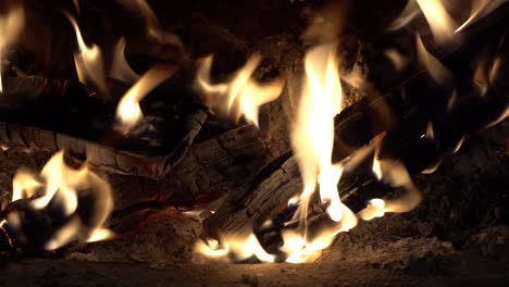 fire burning in wood burning stove. uk