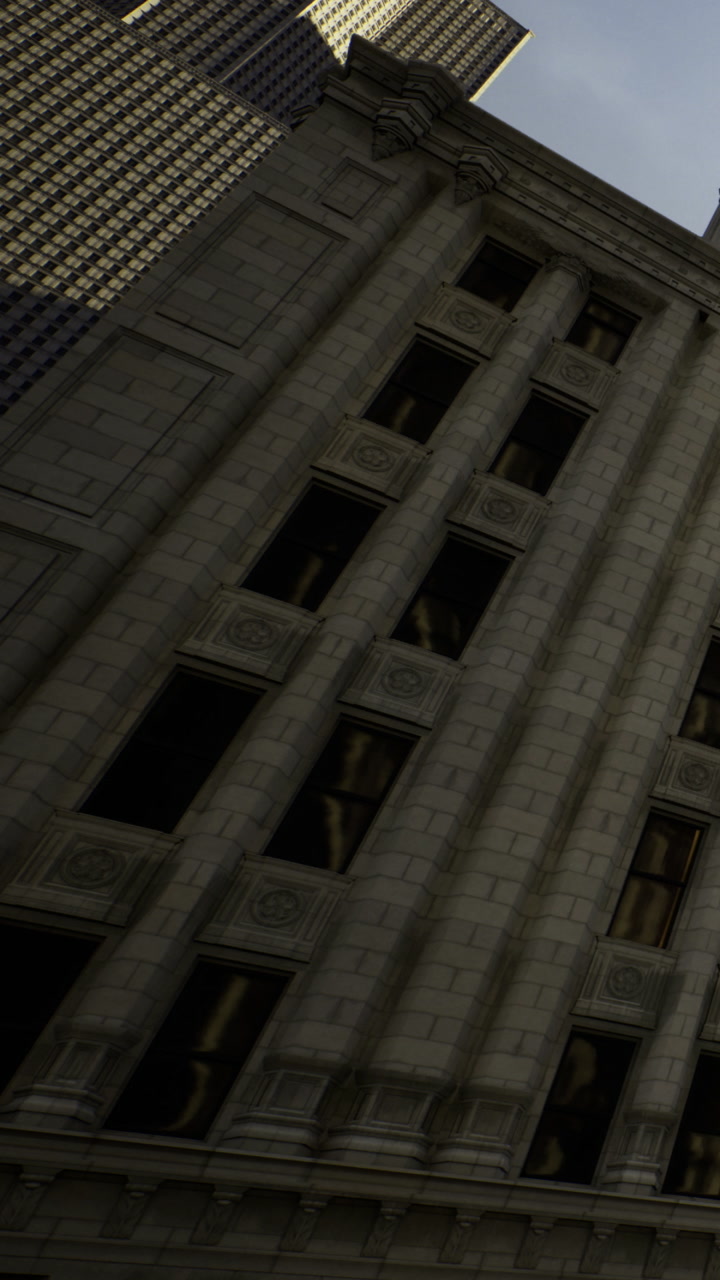 Tall stone building seen from ground level on a cloudy day in the city