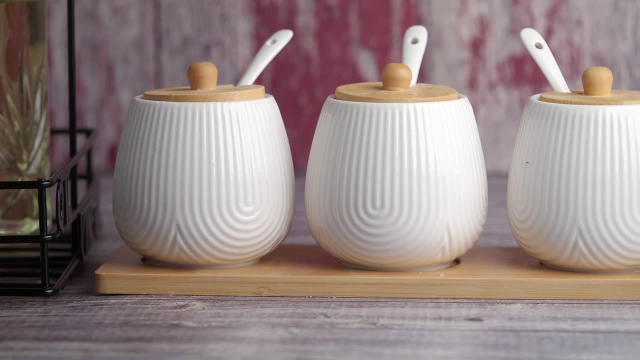Set of White Ceramic Spice Jars with Wooden Lids