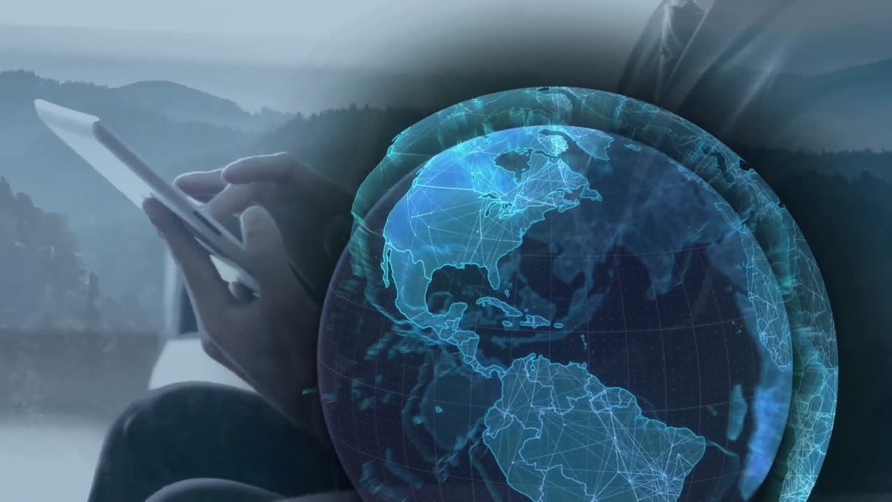 animación del globo azul sobre un hombre de negocios usando una tableta en una ubicación remota