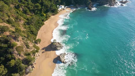 mediterranean beach paradisiaca turquoise blue waters no people aerial view drone spain catalunya costa brava blanes lloret de mar mallorca balearic islands