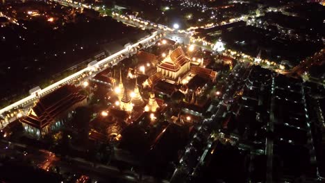 night drone shots of bangkok near wat arun temple, uhd-2