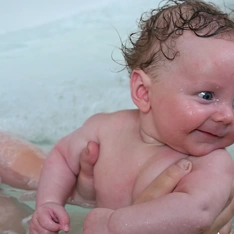 mother and baby in a jacuzzi