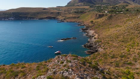 Cala Rossa coastal landscape in Sicily under a clear blue sky