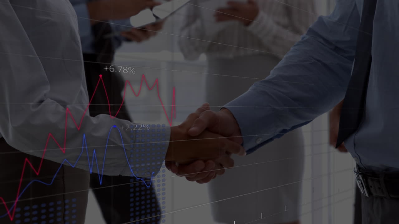 Animation of financial data over caucasian businessmen shaking hands