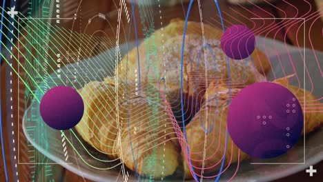 Animation-of-digital-screen-with-spheres-and-data-over-croissants