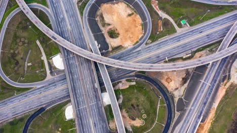 timelapse aerial view of a freeway intersection traffic trails in moscow.