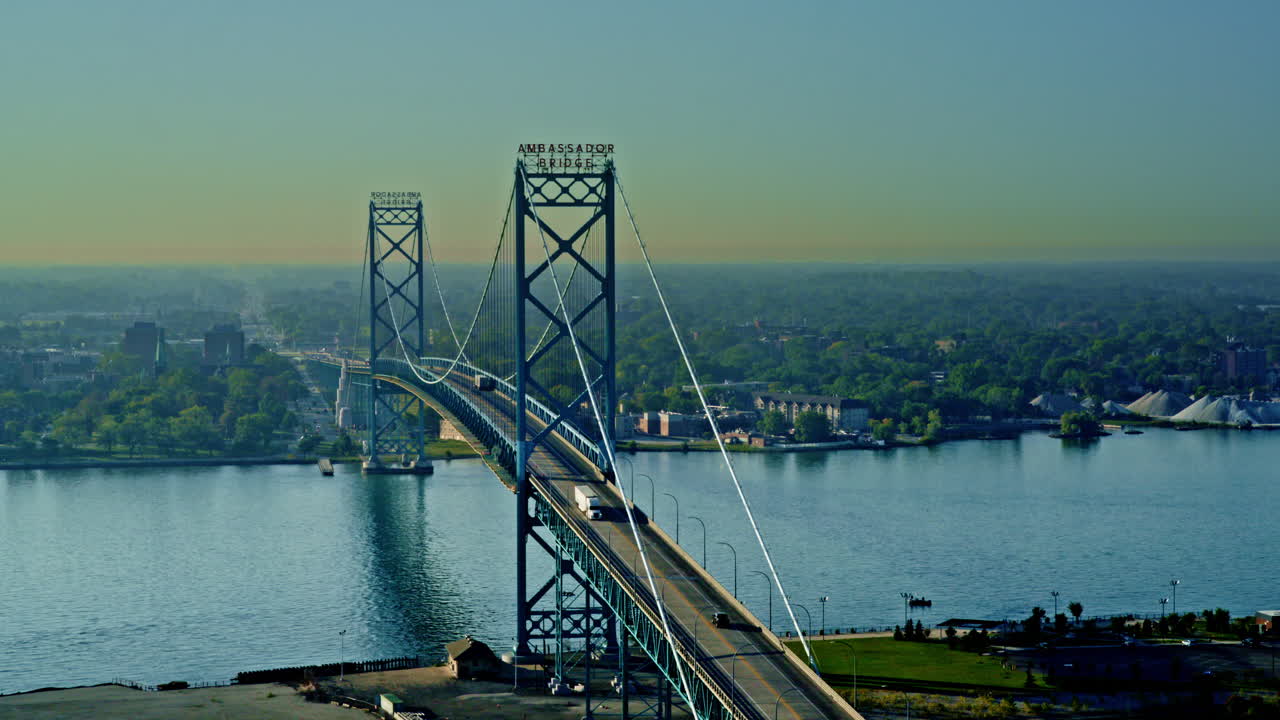 Sweeping drone footage of the iconic Ambassador Bridge connecting Canada and the U.S