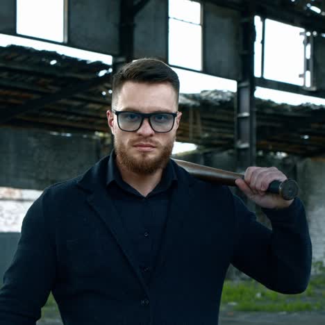 aggressive man with baseball bat