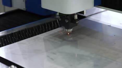 CNC-Laser-cutting-of-metal,-modern-industrial-technology.