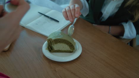 matcha roll cake at a coffee shop