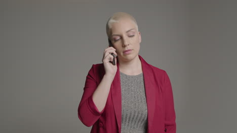 female model talking on smartphone during studio portrait 08