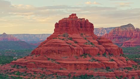 red rock butte with yellow golden clouds and desert alpenglow, epic desert southwest scene