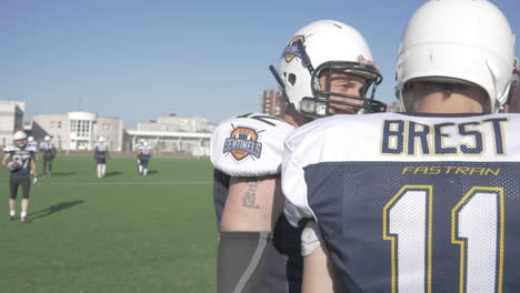 american football players practicing