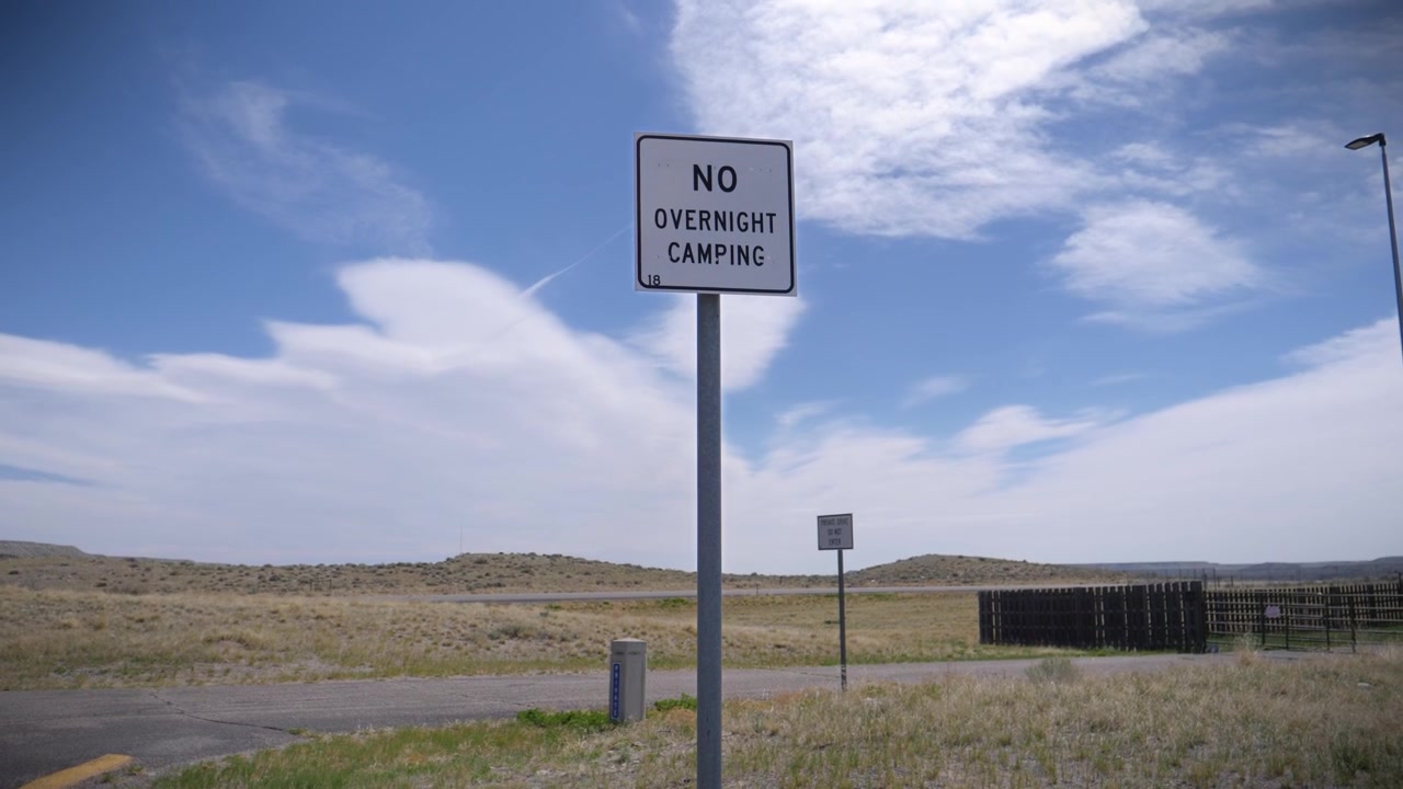 No Overnight Camping Road Sign Standing Beside Rural Road, New Mexico USA