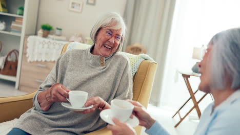 Senior-women-friends,-tea-and-chat-in-living-room