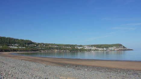 Extra wide shot of new quay bay next to the river Gido on new quay beach. On lower third of frame