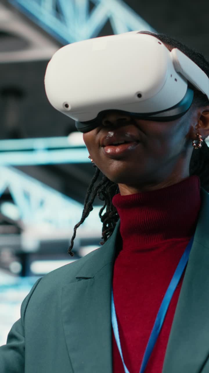Vertical video Data center smiling programmer uses VR headset technology