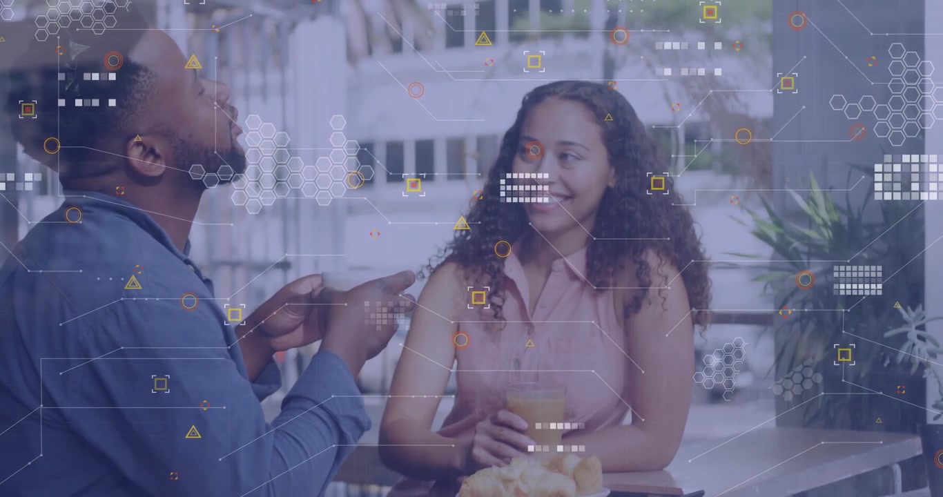 Smiling couple enjoying drinks at cafe with digital data overlay animation