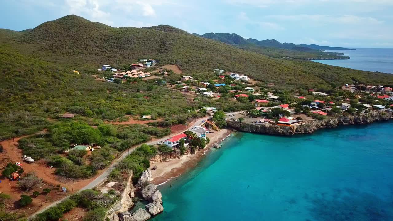 Tilt down aerial view of Forti Beach in Westpunt, Dutch island of Curacao, Caribbean Sea
