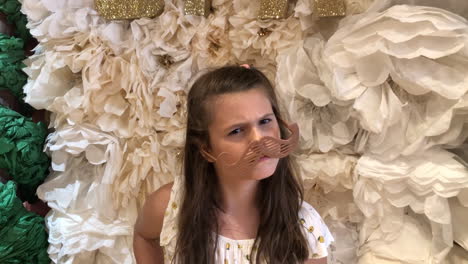 cute girl posing in store with glasses dress up