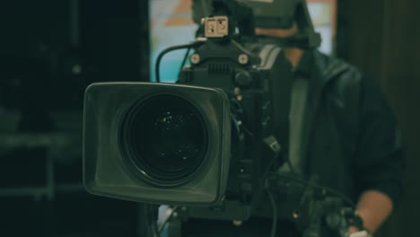 cameraman working in tv studio video production filming interview
