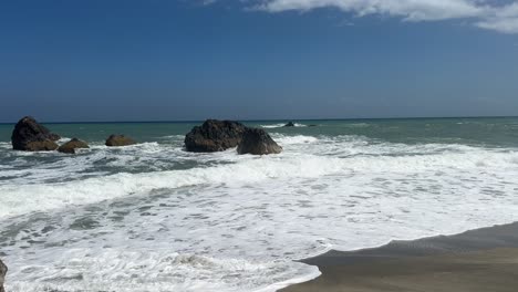 Waves-crashing-against-rugged-rocks