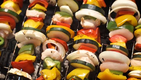 Multiple-colorful-and-tasty-grilled-shashliks-on-outdoor-summer-barbecue