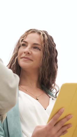 businesswoman listening during meeting montage. vertical